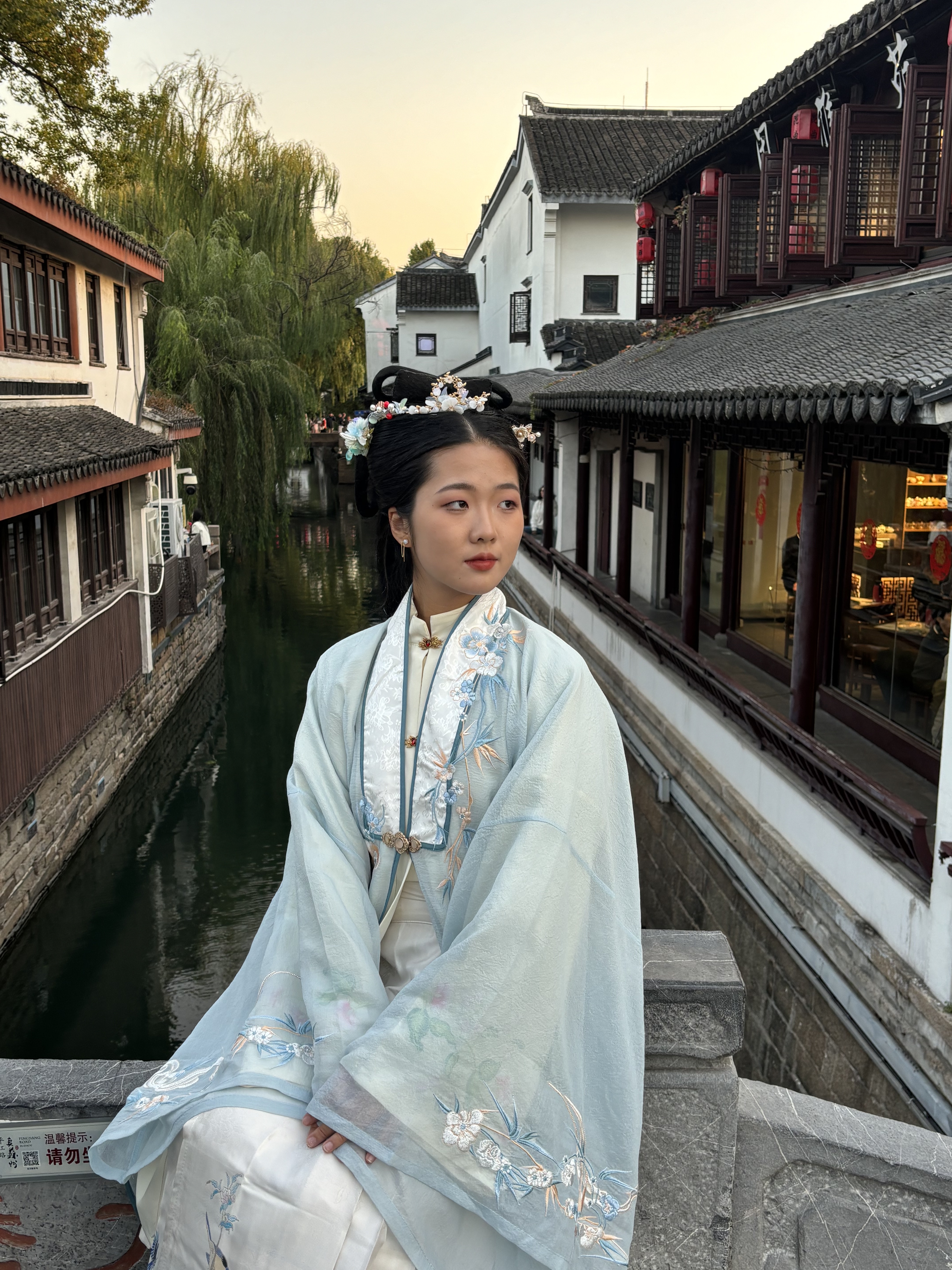 Photo of me taken in a traditional Hanfu in Jiangsu, China. There are lots of people dressing up in these outfits there. This was in December, 2023.