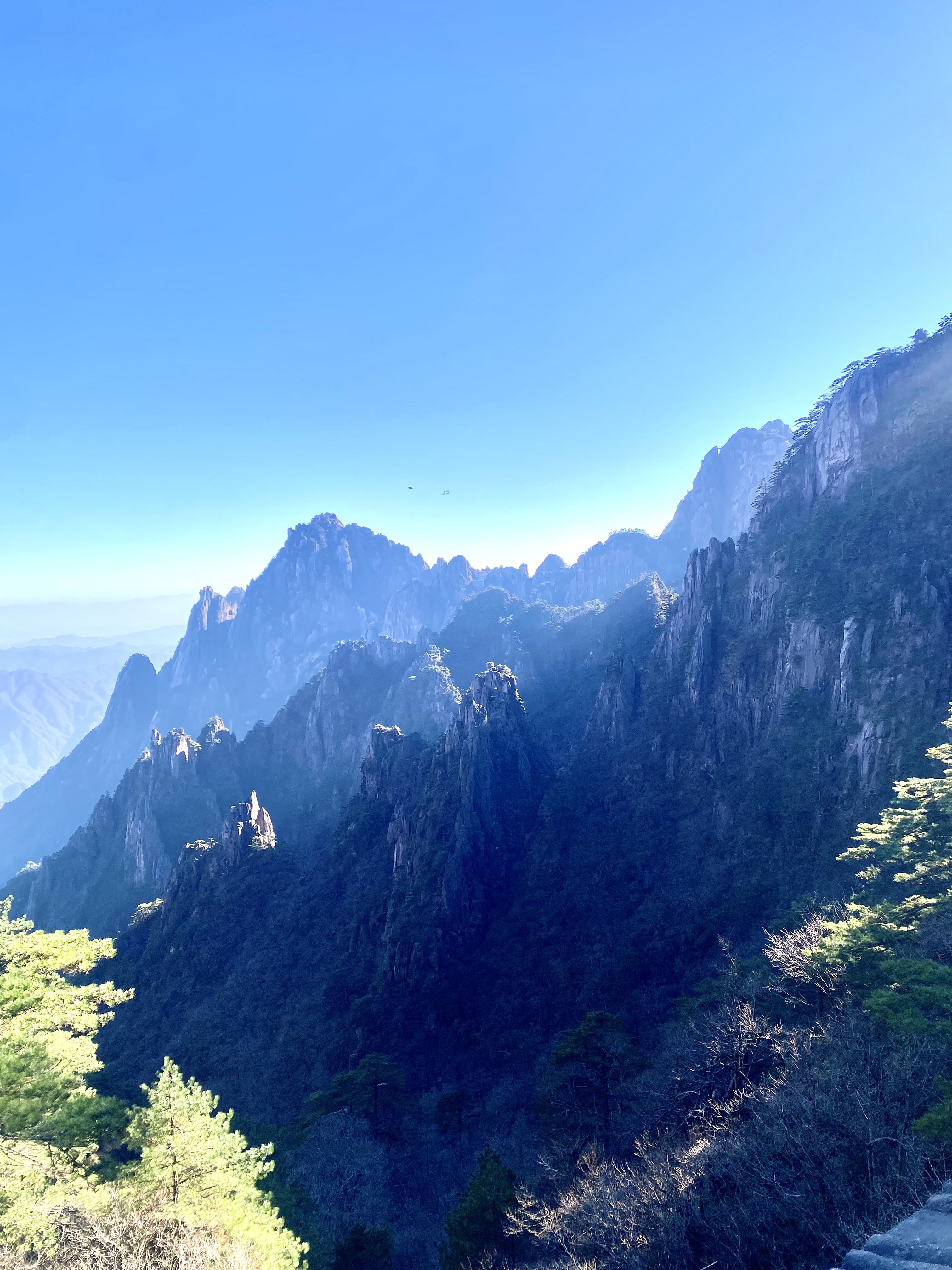 Yellow Mountains in China! My mum insisted we hike up the entire mountain, which took us about 6 hours (alternatively, a 6 minute gondola ride!). The view near the top was amazing!